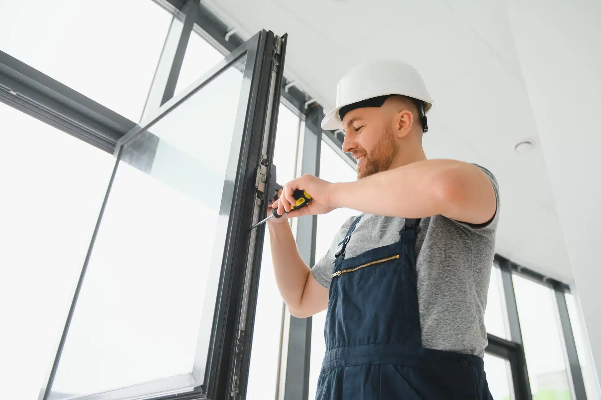 Man Installing Commercial Glass in Sarasota
