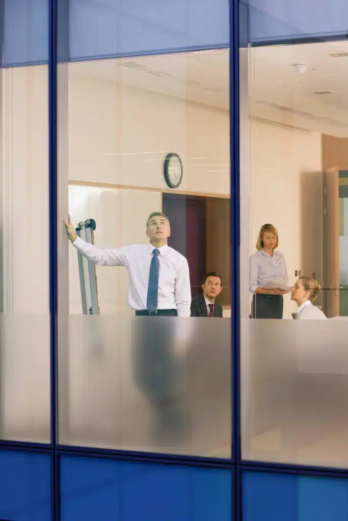 Businessman looking a Commercial Glass Naples
