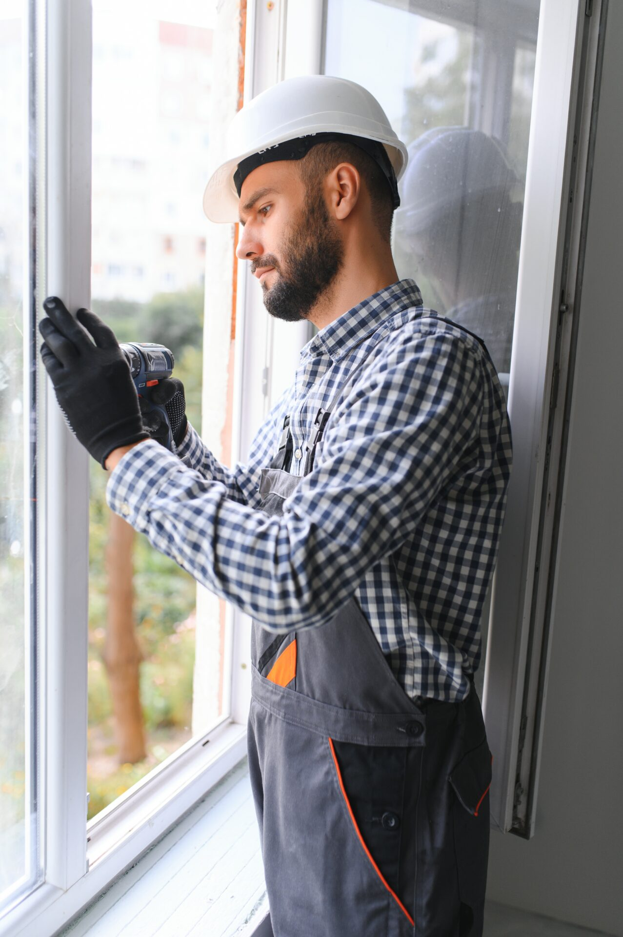 Man installing Insulated Glass