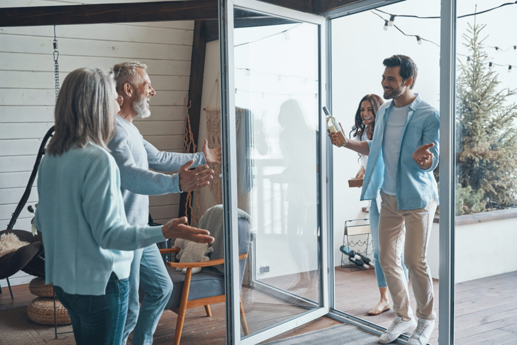 Family in a house with residential glass