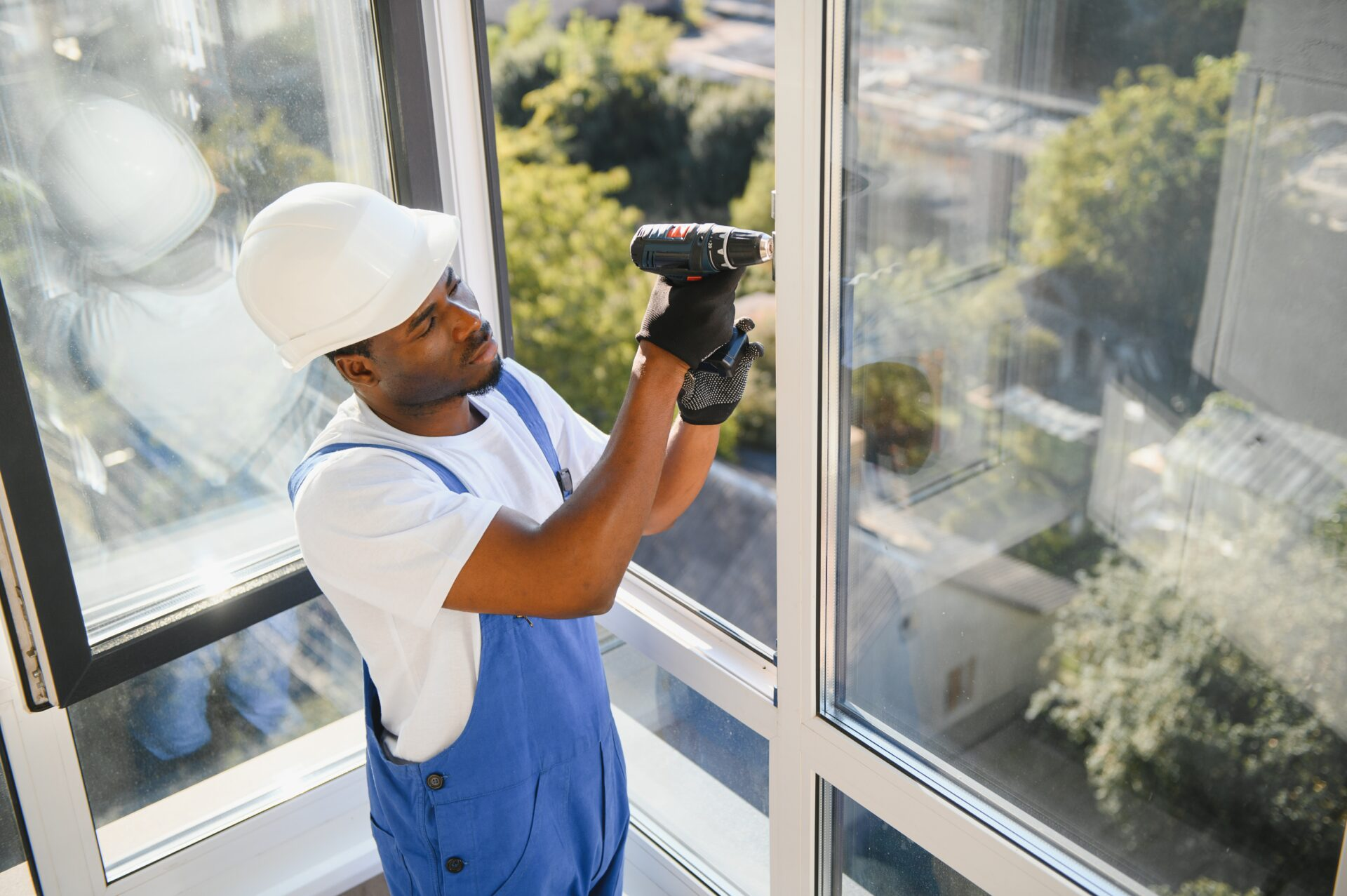 Man repairing Insulated Glass