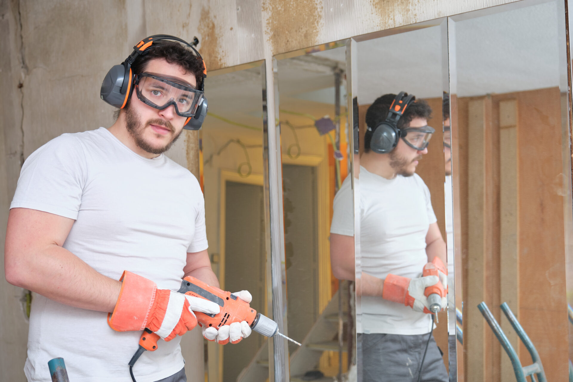 Man installing mirrors