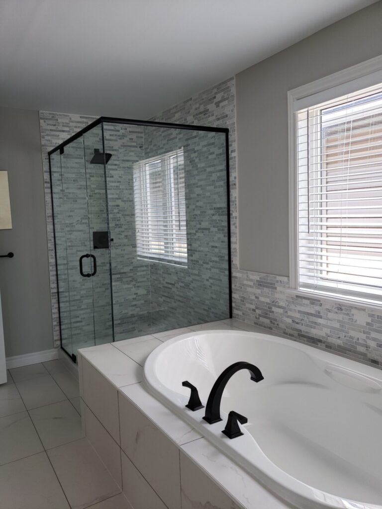 Glass shower door in a modern bathroom in Brandon