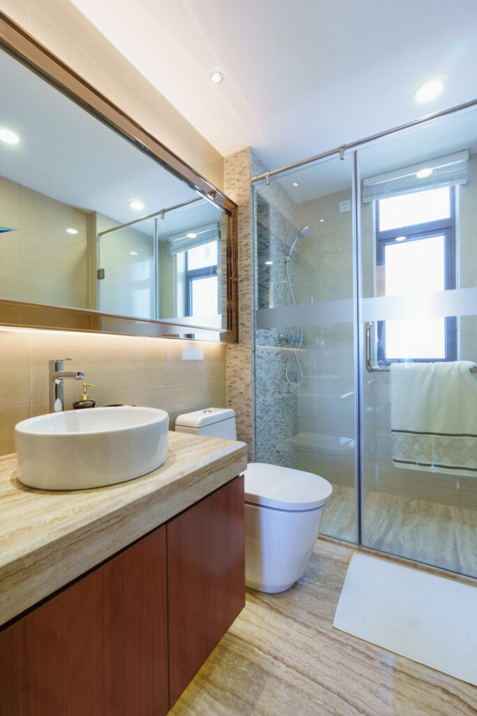 Modern bathroom with glass shower door in Riverview
