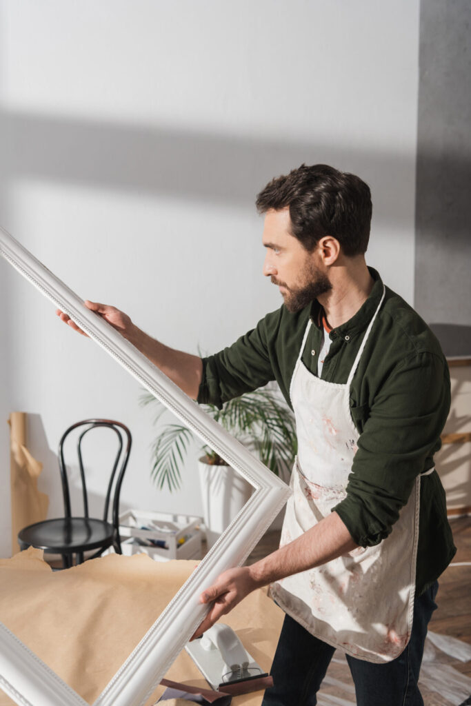 Man repairing a glass window